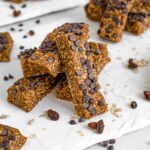 No bake chewy chocolate chip granola bars balance on one another.